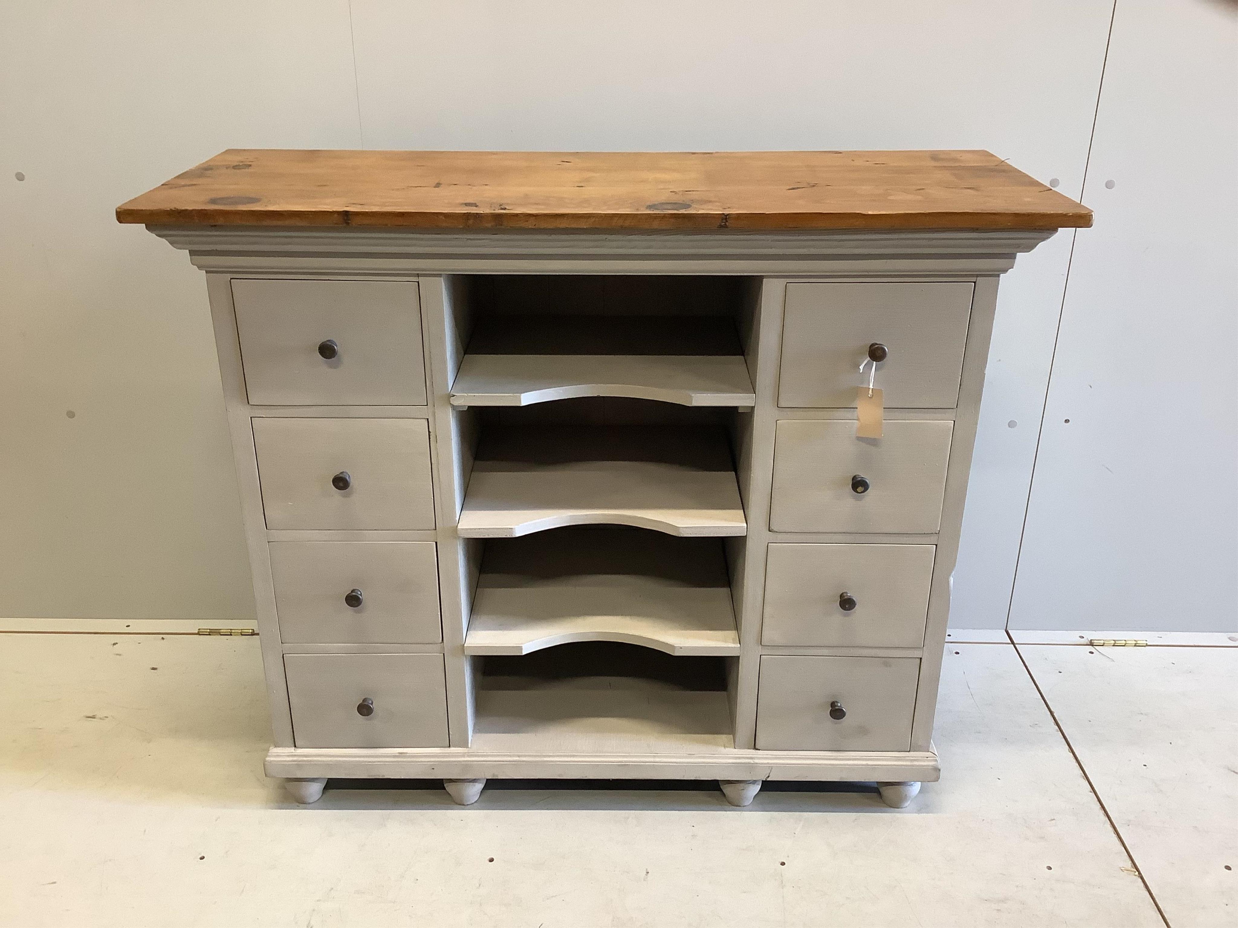 A painted pine eight drawer side cabinet, width 116cm, depth 43cm, height 97cm. Condition - fair to good